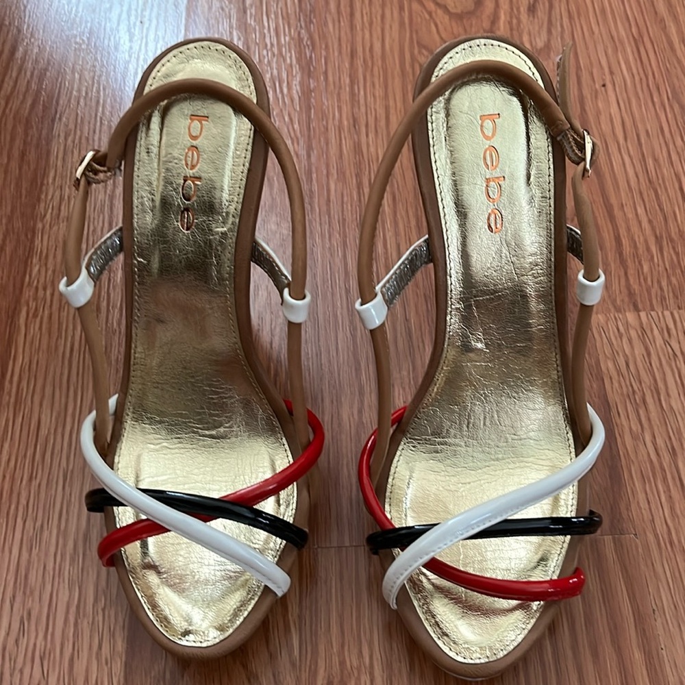 Bebé sling back 4 1/2 inch heels, worn once indoors, size 6, great condition.